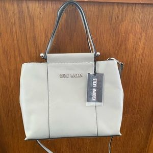Steve Madden hand bag with over the shoulder strap. Never used, with tags.